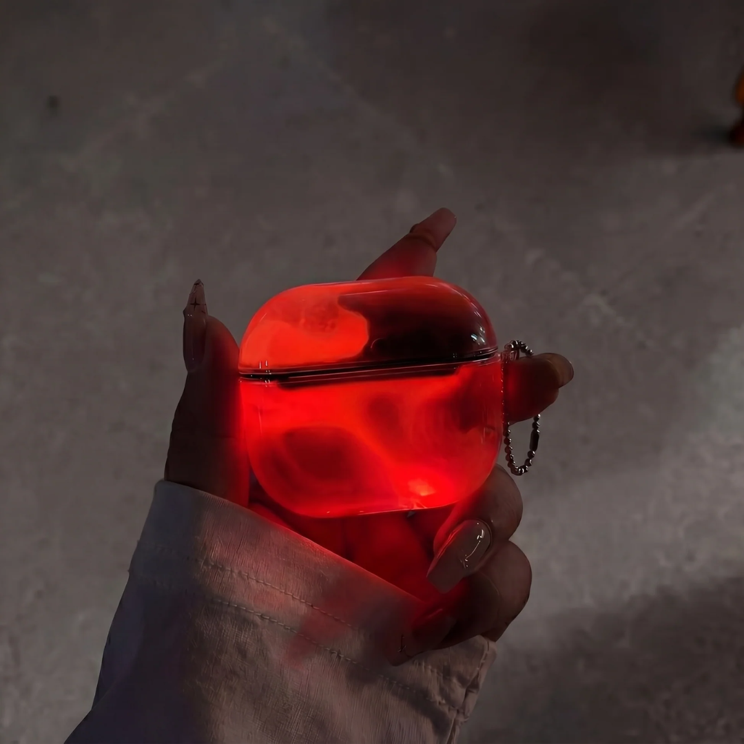 Funda de Airpods Luminiscente con Arena Movediza.