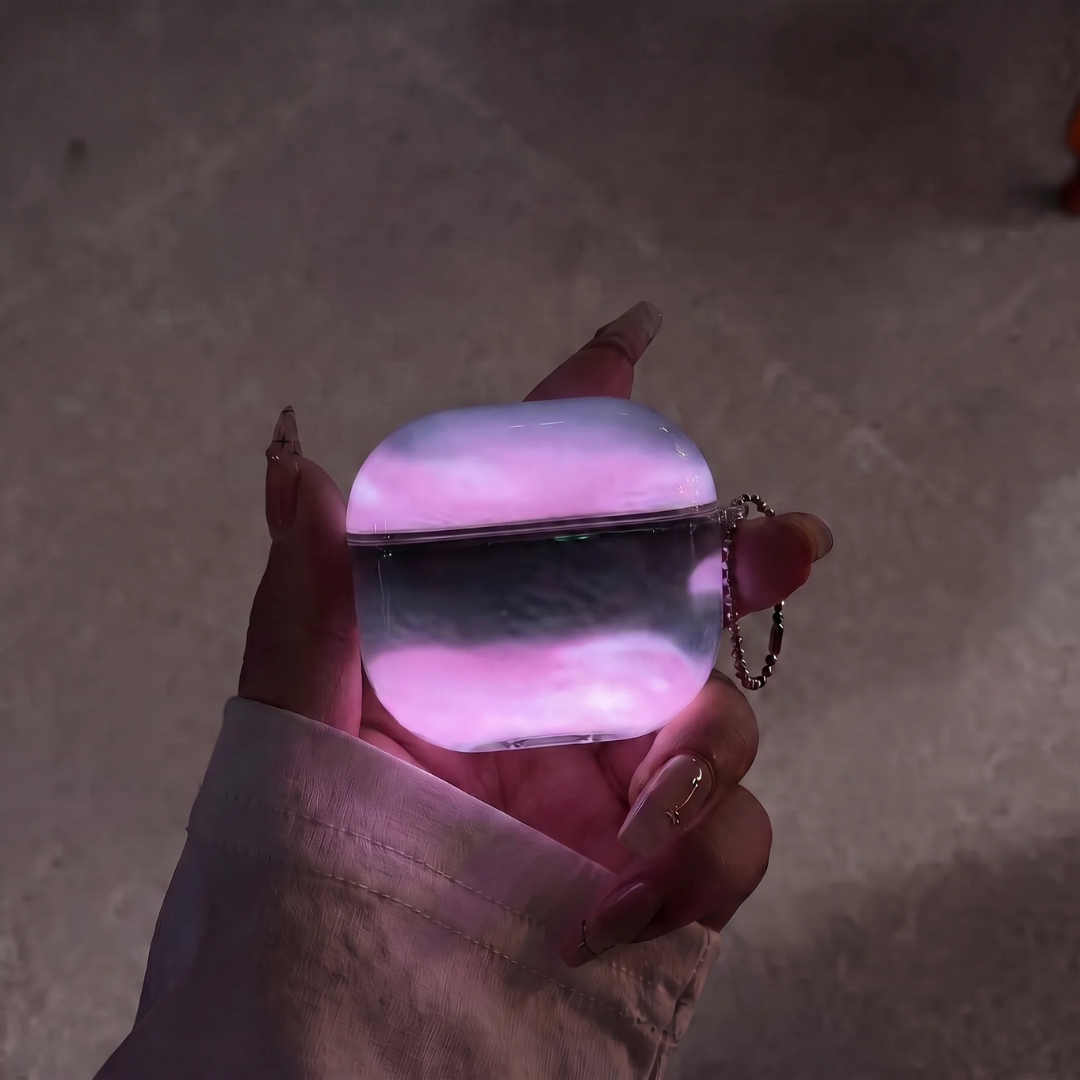 Funda de Airpods Luminiscente con Arena Movediza.