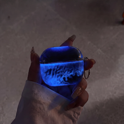 Funda de Airpods Luminiscente con Arena Movediza.