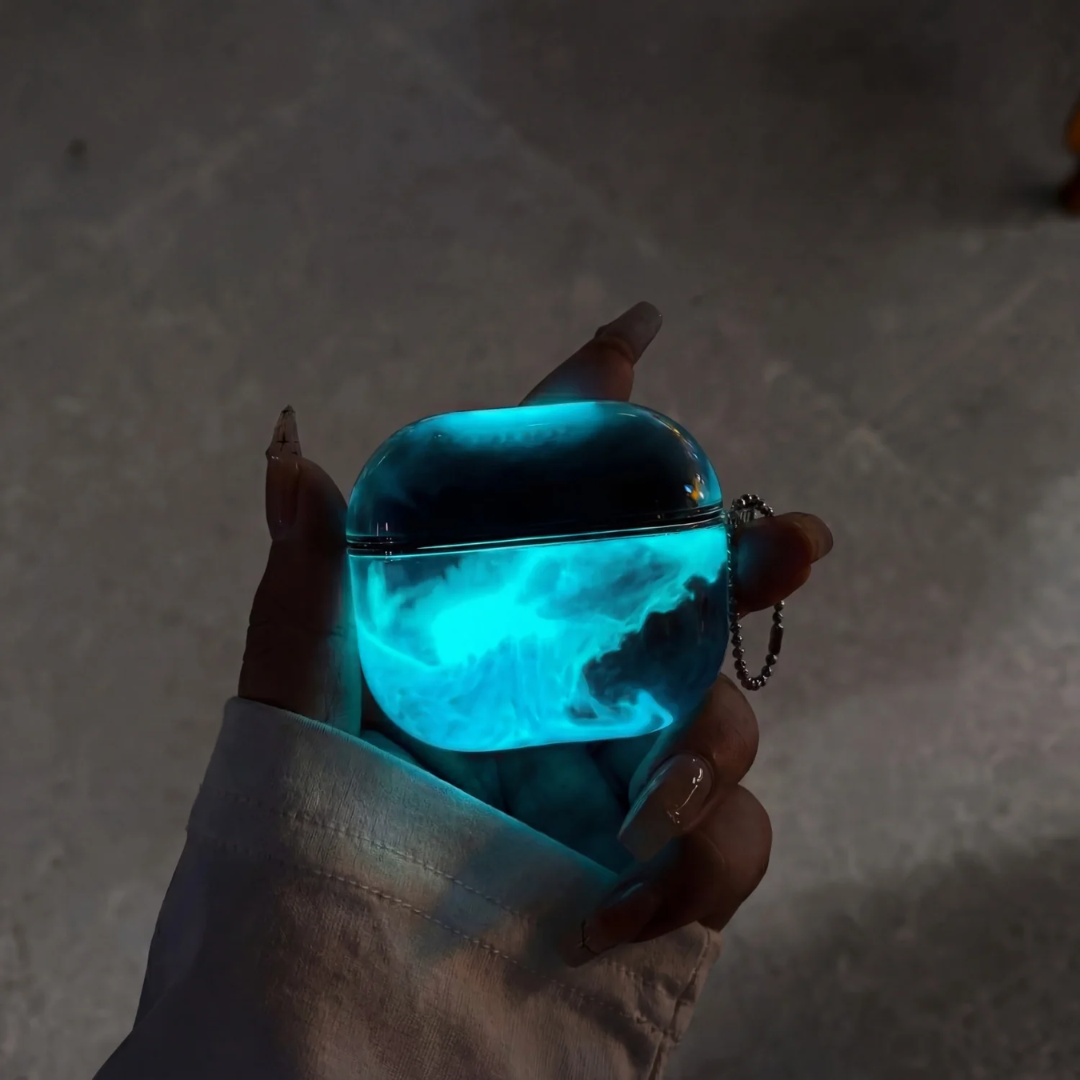 Funda de Airpods Luminiscente con Arena Movediza.